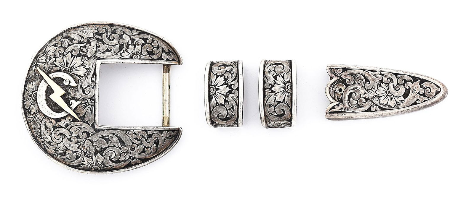 ERNIE MARSH (TCAA) BUCKLE SET: Distinctive four-piece, 1” sterling silver buckle set with a raised letter “C” crossed by a gold lightning bolt, exquisitely engraved by the multiple award winning and founding membe