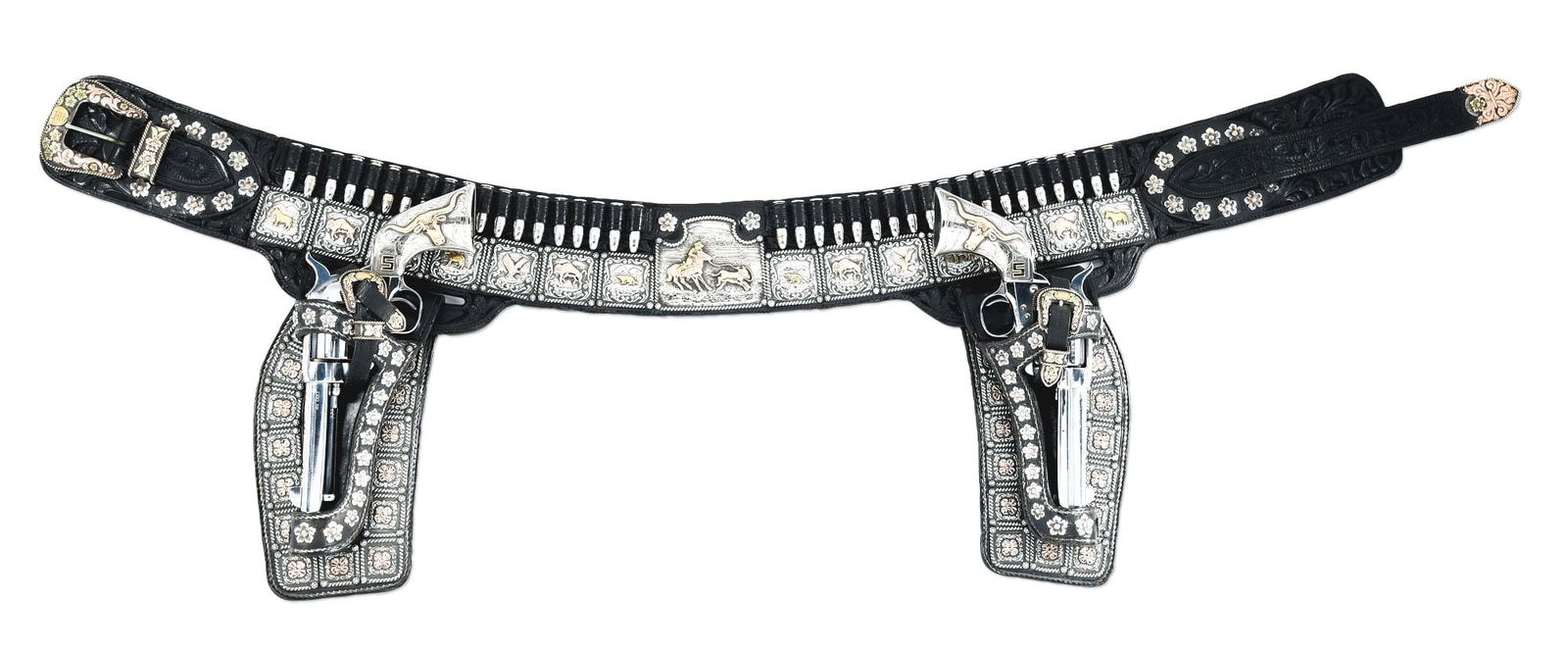 (C) EDWARD H. BOHLIN'S PERSONAL SILVER MOUNTED GUN BELT WITH A PAIR OF BOHLIN MOUNTED COLT SINGLE: This incredible, hefty, one-of-a-kind Bohlin belt and double-holster rig was crafted as part of Edward Bohlin’s famous “Big Saddle,” his 14-year masterpiece equestrian parade ensembl