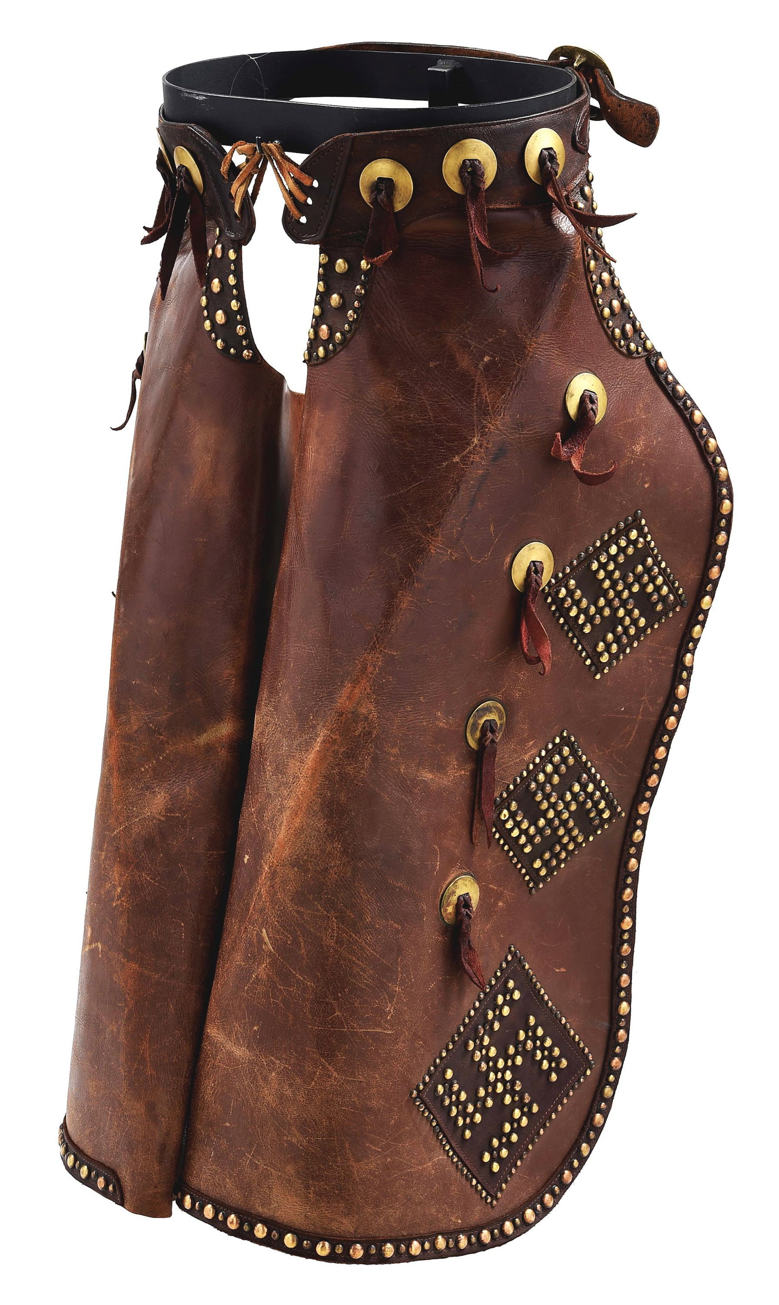DEVORE'S SADDLERY HELENA MONTANA BATWING CHAPS: A heavily studded pair of mid-century batwing chaps, marked on the billet "DeVore's Saddlery / Helena, Montana". Overlaid with graduated diamonds and edge bindings and studded with swastika designs. T