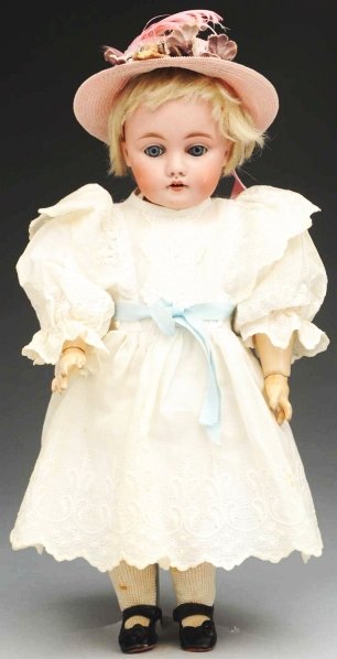 Delightful Kestner Character Child.: Bisque socket head incised “B made in Germany 6 143”, blue sleeping eyes, molded upper eyelid, multi-stroked light brown eyebrows, painted upper and lower eyelashes, open mouth with two upper teet