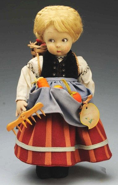 Italian Lenci Child Doll.: All felt doll with molded face, painted brown side-glancing eyes, blonde mohair wig with braids across the top; all original outfit representing the “Piemonte” region of Italy, carrying a basket o
