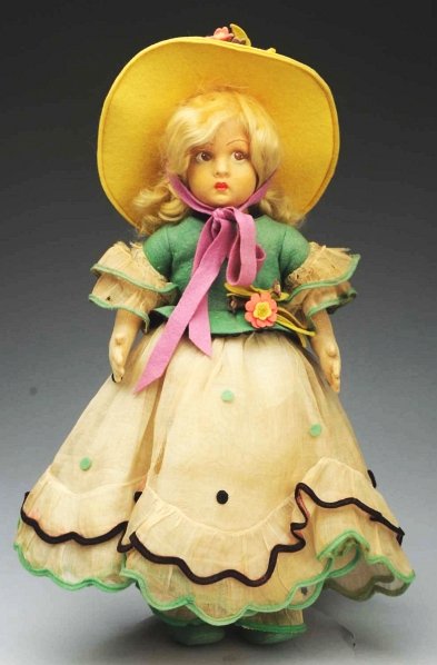 Italian Lenci Child Doll.: Lucia face of molded felt with side-glancing brown painted eyes, closed mouth, blonde mohair wig; original felt and organdy costume (some deterioration to organdy on sleeves, overall dusty, some disco