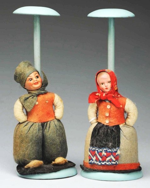 Lot of 2: Hat Stands.: Wooden stands have dolls with composition heads and stuffed cloth bodies. Very unusual. Condition (Very Good). Size 9 - 1/2" T.