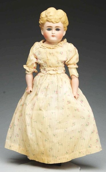 Desirable German Bisque Child Doll.: Bisque shoulder head by Alt, Beck & Gottschalck 1210 # 6 with short curly blonde hair in 1880s style with lots of comb marks and deep modeling, rarely found glass inset eyes with lots of threading, cl