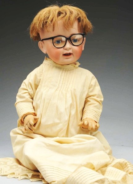 Laughing German Bisque Character Baby Doll.: Socket head incised “O made in Germany 18 JDK 211” by J.D. Kestner, replaced blue set eyes, painted upper and lower eyelashes, multi-stroked eyebrows, plaster dome (pieces missing), original human