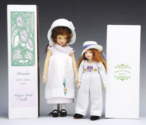 Lot of 2: Maggie Iaconno Dolls.: All felt, jointed dolls with molded hand-painted faces and mohair wigs. “Kim” with extra apron and handbag 2008 UFDC doll and “Meadow” both all original and boxed. Condition (Excellent). Size 