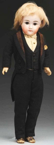 Early Kestner Child Doll.: Bisque socket head incised “7 ½”, multi-stroked eyebrows, brown sleeping eyes, painted upper and lower eyelashes, rosy cheeks, closed pouty mouth, small ears, chin dimple, plaster dome, replaced