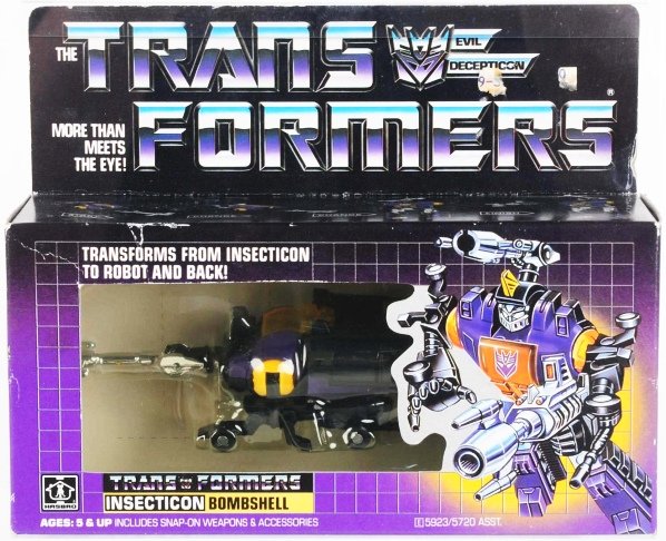 Transformers Bombshell AFA 75.: Hasbro. Japanese rhinoceros beetle Bombshell was known for mind control in the Transformers series. This toy is complete, sealed and professionally graded by AFA. Condition (Near Mint Plus). Size Box:
