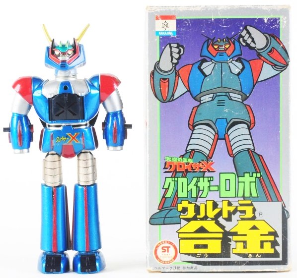 Gorizer X.: Nakajima. Vinyl head diecast and masterpiece by Go-Nagai. Gorizer X has a light up chest that shows through as a red X. In the feet are twin drill vehicles tucked away. Fists fire. Great new old stock