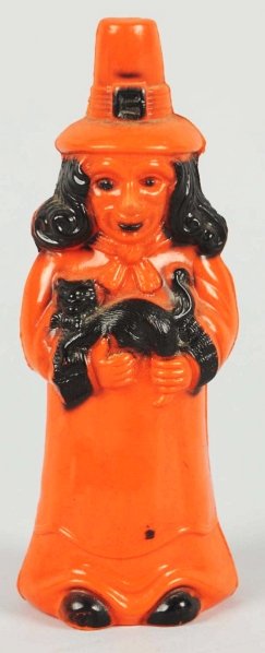 Celluloid Halloween Witch Holding Cat Figure.: One dent in rear of base. Condition (Very Good). Size 4 - 1/2" T.