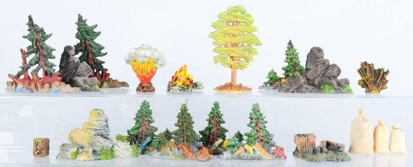 Large Lot of Elastolin Trees, Rocks, Etc.: Includes a group of battlefield diorama accessories. Trees, rocks, bomb bursts, and campfires. Condition (Good - Very Good).