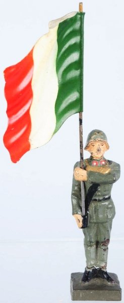 Lineol Standing Italian Flagman.: Figure has chips to face and cracks to ankles. Condition (Good).