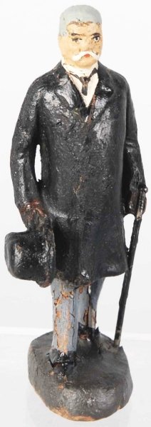 Elastolin Hindenburg in Top Coat.: Holding top hat. Head may be embellished. Entire figure has touchup. Condition (Good - Very Good).