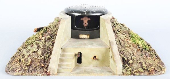 Lineol Artillery Bunker with Raising Cannon.: The cap firing mechanism is present but not working. Cannon raises, lowers, and rotates. The rotation wheel on the end of the shaft is missing. Condition (Very Good - Excellent). Size 20" x 18".