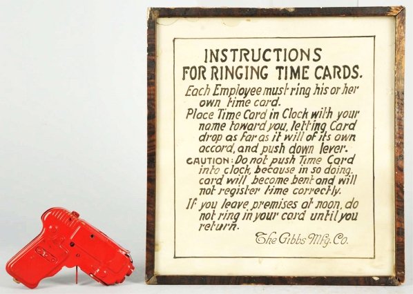 Lot of 2: Early Marx & Gibbs Toy-Related Items.: Includes a prototype Marx pistol and a framed Gibbs Company timecard instruction plaque. Condition (Very Good). Size Gun: 4 - 1/4" L.