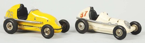 Lot of 2: Cast Metal Gas-Powered Race Car Toys.: American. Includes one Ohlsson & Rice No. 76 race car with motor and one Thimble Drome No. 37 without motor. Some paint chipping and wear overall. Condition (Very Good). Size Largest: 10" L.