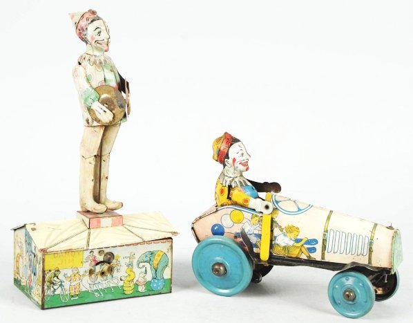 Lot of 2: Tin Litho Unique Art Wind-Up Toys.: American. Working. Includes one Krazy Kar and one Dandy-Jim Roof Dancing toy. Both with original arms and some repaint to Krazy Kar wheels. Both toys with some overall fading and wear. Condition (Good