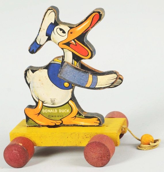 Walt Disney Fisher Price Donald Duck Pull Toy.: American. Marked "W.D. Ent.". Replacement arms and some soiling to paper. Condition (Very Good). Size 8 - 1/2" T.