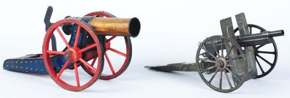 Lot of 2: Early Tin Cannon Toys.: Toys are operational and shoot projectiles. Includes one German cannon depicting a WWI Field Cannon with early Marklin mark on front of iron barrel. Also includes one American cannon depicting a Civil