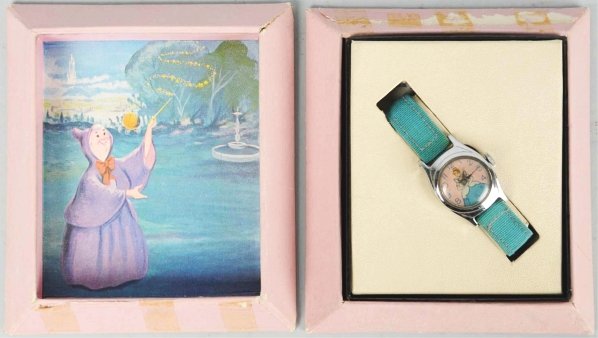 Cinderella Character Wrist Watch.: Circa 1955. Made by Timex. Watch is over-wound and not working. Includes scarce packaging version of the original box with insert. Inside of box shows a movie scene from Cinderella that looks a little