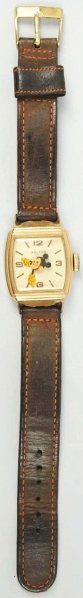 Walt Disney Mickey Mouse Character Wrist Watch.: Circa 1946. Made by Kelton. Hard-to-find watch with plastic dial. This is the first post-war Mickey Mouse wrist watch. Some wear overall. Includes original box with guarantee. Condition (Very Good - E
