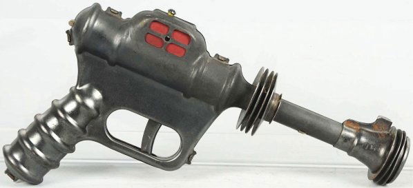 Daisy Buck Rogers Atomic Pistol & Holster.: Inscribed "Buck Rogers Atomic Pistol" on holster. Pistol is working but does not light up. Gun has some oxidation at end of gun site. Holster is in very nice shape. Condition (Very Good - Excellent).
