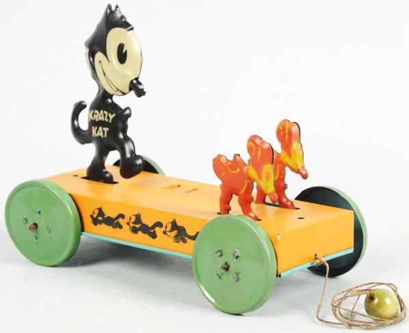 Tin Litho Chein Krazy Kat Pull Toy.: American. When pulled, Krazy Kat and mice move up and down. Unusual version with bellows attachment to bottom of base. Bellows is not working. The mice are all original but there is some repainting to