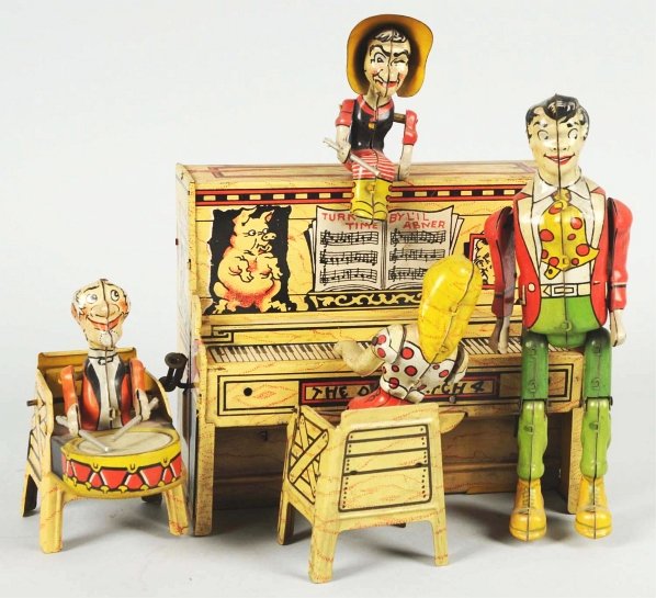 Tin Litho Unique Art Lil' Abner Band Wind-Up Toy.: American. Working. All original parts. Depicts members of the Dog Patch Band. Some scratching and wear throughout. Condition (Very Good). Size 10" L.