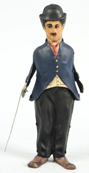 Tin Litho Charlie Chaplin Walking Wind-Up Toy.: Working. Lead feet with tin body. Replaced arms and cane. Some areas of repainting throughout. Condition (Good - Very Good). Size 8 - 1/2" T.