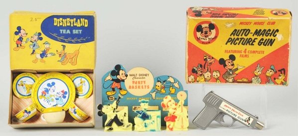 Lot of 3: Disney Mickey Mouse Character Items.: Includes one Chein Disneyland tea set in original box, one Mickey Mouse Club Picture Gun in original box but missing film, and one set of three plastic party baskets on original card. Condition (Very