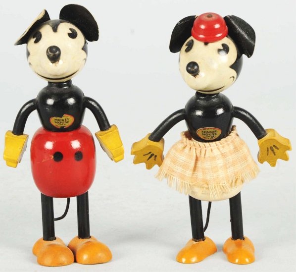 Pair of Disney Mickey & Minnie Fun-E-Flex Figures: American. Original hat and ears. Slight chipping to chest decals and feet are slightly loose. Condition (Excellent). Size Each: 4 - 3/4" T.