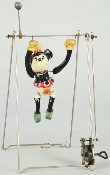 Celluloid Minnie Mouse Acrobat Wind-Up Toy.: Japanese. Pre-war. Working. Inspection label on front. Nose is slightly pushed up but not denting or cracks. Condition (Very Good - Excellent). Size 9" T.