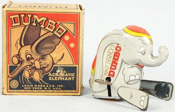 Tin Litho Marx Walt Disney Dumbo Wind-Up Toy.: American. Works well. Marked "Walt Disney Productions". Some overall scratching to toy. Includes scarce and colorful original box with some creasing. Condition (Very Good). Size 4" T.