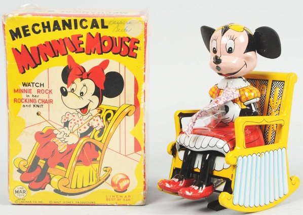 Tin Linemar Disney Minnie Rocking Chair Toy.: Japanese. Wind-up mechanism is working. Original knitting material and original ears that have hardened due to age. Includes colorful original box with some creasing and ink writing. Condition (Very G