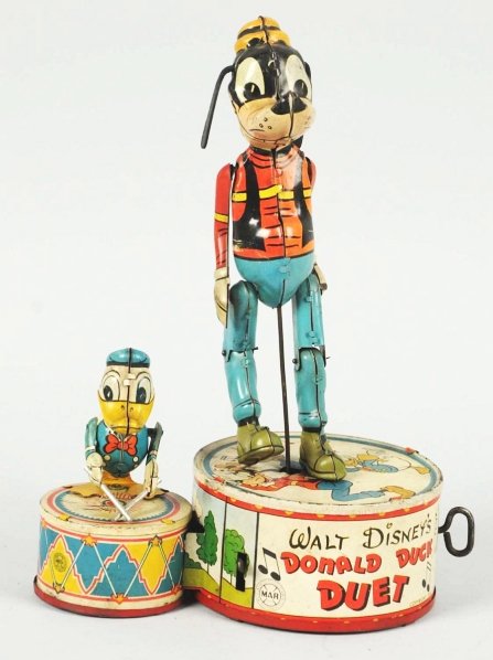Walt Disney Marx Donald Duck Duet Toy.: American. Working. Marked "Copyright 1946 Walt Disney Productions". Donald Duck has replacement arms and Goofy has replacement rubber ears. Condition (Good - Very Good). Size 10" T.