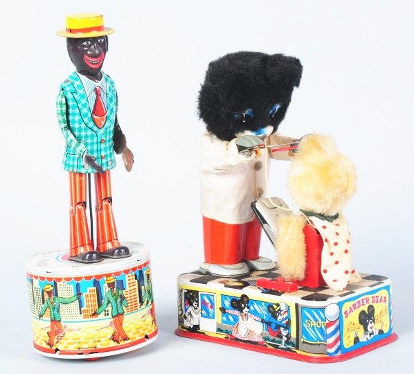 Lot of 2: Character Battery-Operated Toys.: Japanese. Working. Includes one Barber Bear and one African American Roof Dancing toy with original rubber ears. Barber Bear has some soiling to clothing. Condition (Very Good). Size Largest: 10 - 1/2