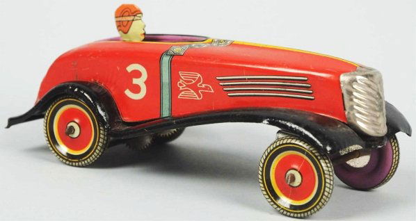Tin Litho Race Car Wind-Up Toy.: Japanese. Pre-war. "KK" airplane mark on back of car and "3" on both sides of car. Separate tin grille and driver. Some scratching and wear overall. Condition (Excellent). Size 6 - 1/4" L.
