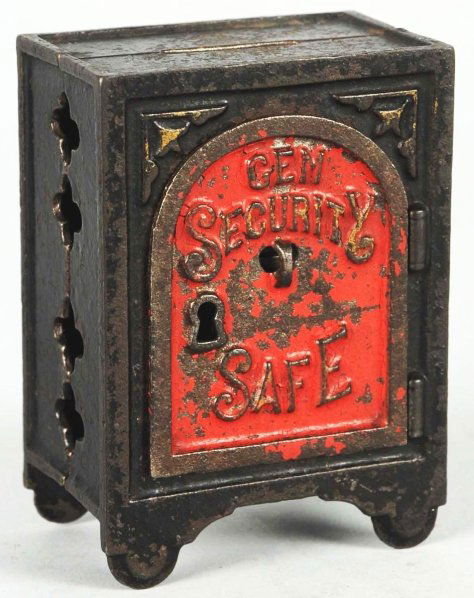 Cast Iron Gem Security Safe Still Bank.: Painted black with red door and gold trim. Key lock door with key. Coin slot in top. Door has small handle in center. Condition (Very Good). Size 3 - 1/2" T.