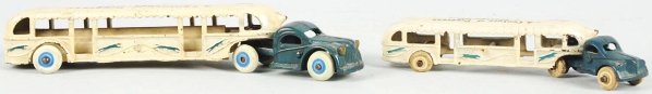 Lot of 2: Cast Iron Arcade Tractor Trailer Toys.: American. Both are GMC Chicago World's Fair 1933 Century of Progress tractor trailers. Larger toy has all replaced wheels and one is missing. Some paint scratching and overall wear. Condition (Very Go