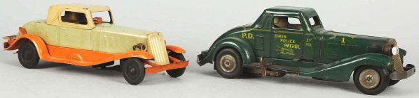 Lot of 2: Pressed Steel Vehicle Wind-Up Toys.: American. Working. Includes one Girard Coupe and one Marx Siren Police Patrol. Both with battery-operated headlights. Both have scratching and wear throughout and Marx car is missing one headlight. Co