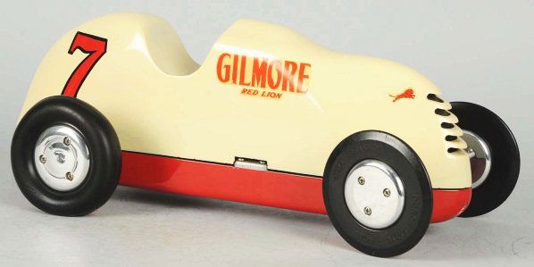 Pressed Steel Duro-Matic Gas-Powered Race Car Toy: Decals read "Gilmore & Red Lion". on both sides and number "7" is painted on both sides of rear. Black rubber tires. Condition (Restored). Size 16 - 1/2" L.