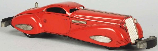 Tin Litho Marx Reversible Coupe Wind-Up Toy.: American. Working. Original rubber bumpers. Some scratching and wear overall with one small dent to roof. Condition (Very Good - Excellent). Size 16" L.