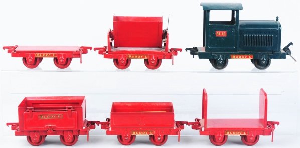 Pressed Steel Buddy L Mining Loco Set.: American. Includes engine marked "BL-16" on both sides of cab doors, one side dump car, two flat cars, one gondola, and one dump car. Some minor paint loss and wear throughout. Decals are strong. Cond