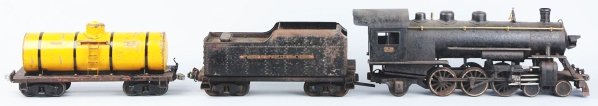 Pressed Steel Buddy L Freight Train Set.: Includes steam engine, tender, and ten freight cars. The ten freight cars consist of two tank cars, one cattle car, one boxcar, one gondola, one steam shovel, one sand and gravel car, one flat car, on