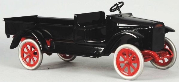Pressed Steel Buddy L Dump Truck Toy.: Complete professional restoration to an all original toy. Decals are replaced as well. Condition (Restored). Size 24" L.