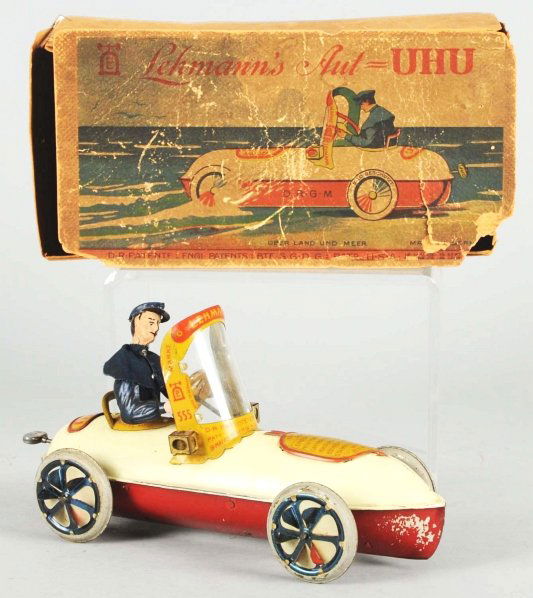 Tin Litho Lehmann Uhu Automobile Wind-Up Toy.: German. Working. All original. Only some moderate overall wear and minor paint flaking to bottom. Comes with extremely rare original box with nice lithographed picture of Amphibian Car going into wate