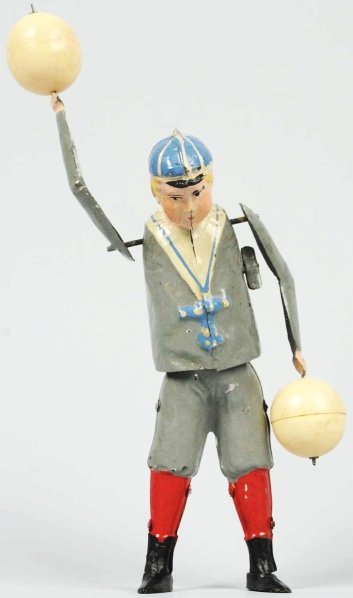 Hand-Painted Tin Ball Playing Boy Wind-Up Toy.: German. Probably made by Bing or Gunthermann. Working. Balls are celluloid. Very little wear. Exceptional condition for this toy. Condition (Near Mint). Size 7 - 1/2" T.