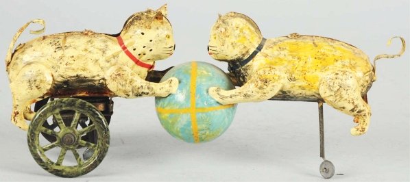 Hand-Painted Tin Cats & Ball Wind-Up Toy.: German. Working. Complete restoration to an unusual toy. Condition (Restored). Size 8" L.