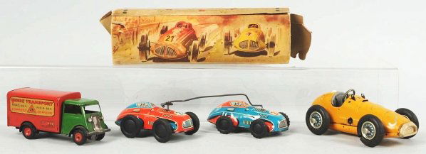 Lot of 3: European Tin Vehicle Wind-Up Toys.: Working. Includes one Schuco Grand Prix Racer, one German Racer Car set with two cars in partial original box, and one English Minic Truck with chipping to decals. Condition (Very Good). Size 9 - 3/4"