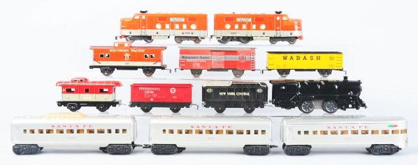 Lot of 3: Tin Litho Marx Train Sets.: American. Includes one New York Central steam engine freight set with original box, one Southern Pacific diesel freight set with original box, and one set of three Santa Fe passenger cars. Various con